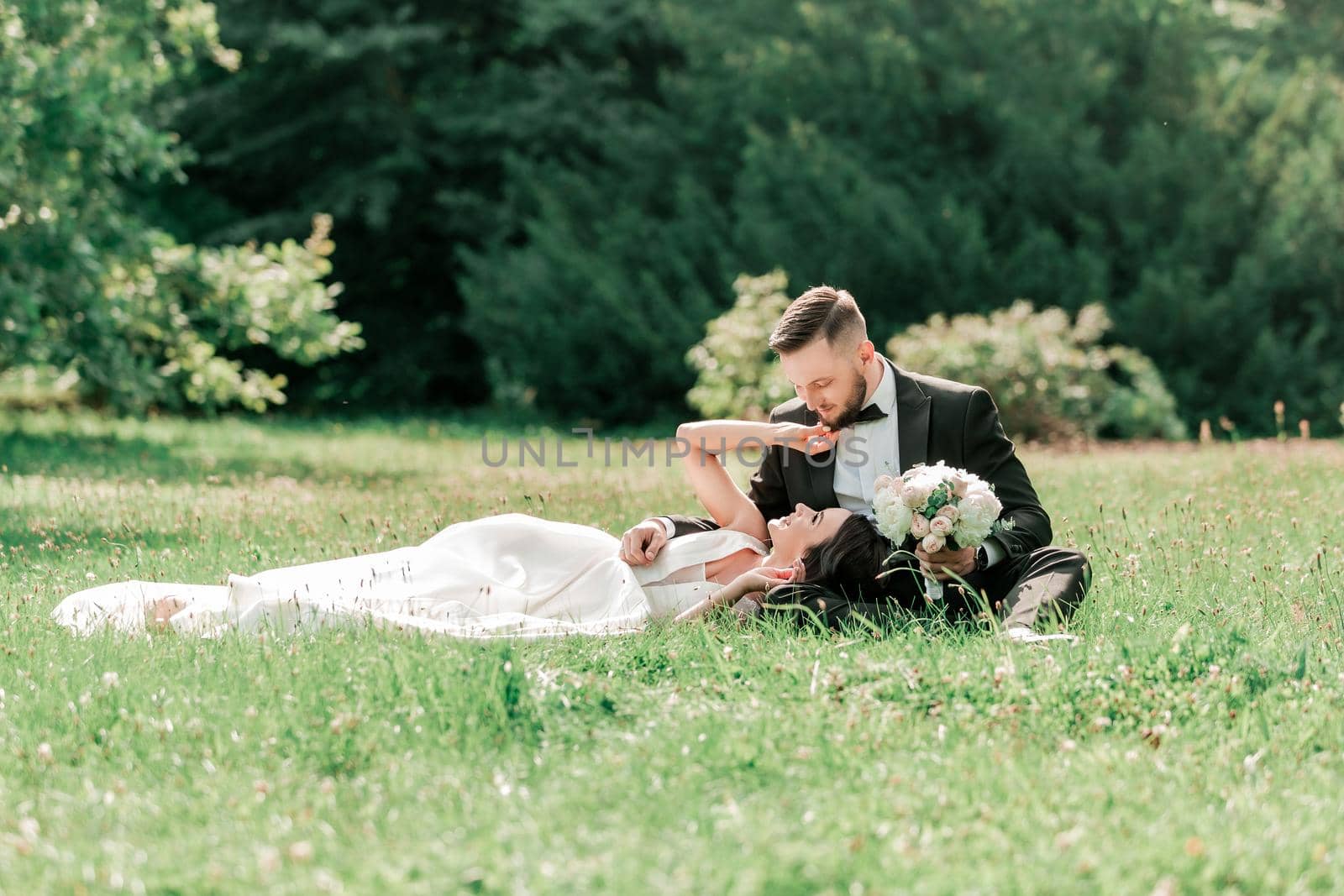 couple in love on the lawn in the summer Park. events and traditions