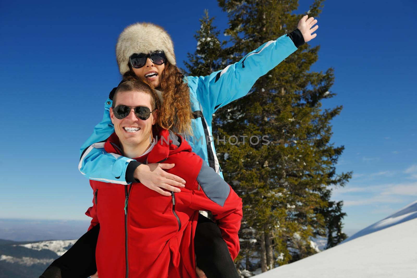 Young Couple In Winter  Snow Scene by dotshock