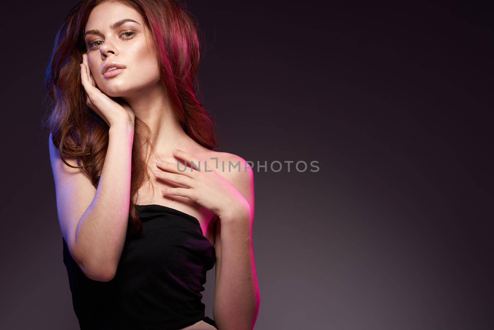 sexy woman black dress posing studio fashion hairstyle model lifestyle. High quality photo