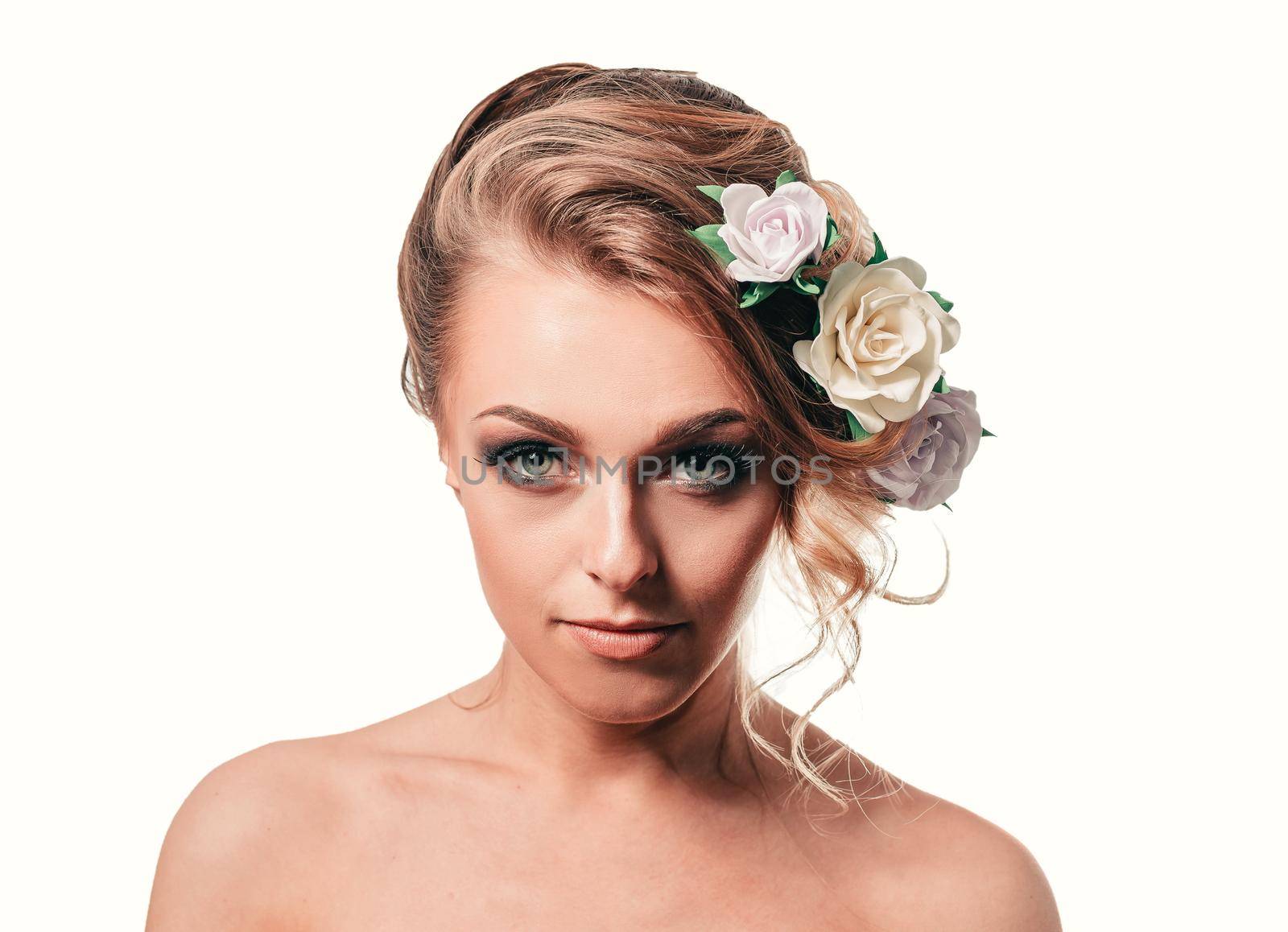 young woman with stylish hair and evening makeup . isolated on white background