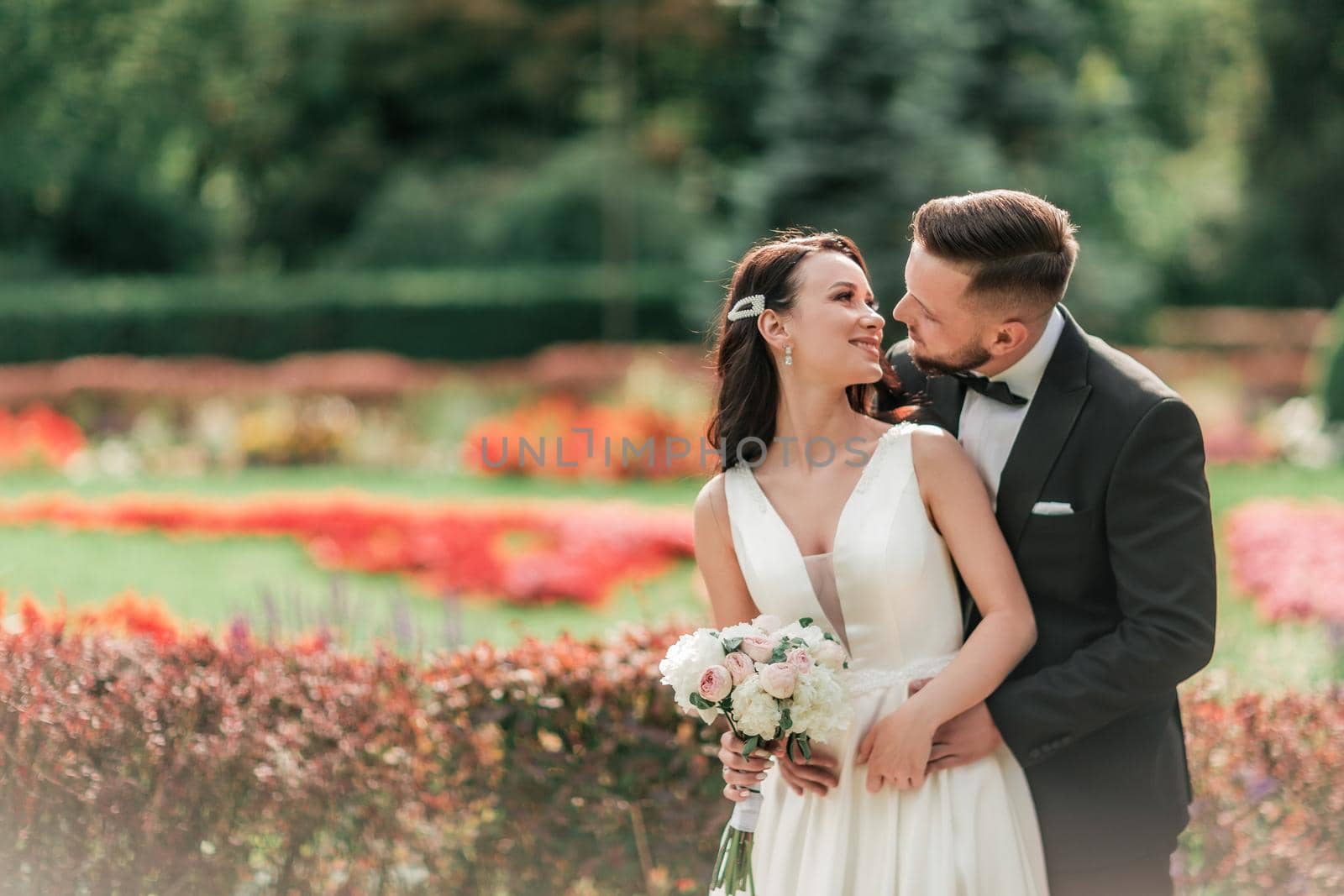 portrait of happy bride and groom on their wedding day. photo with copy space