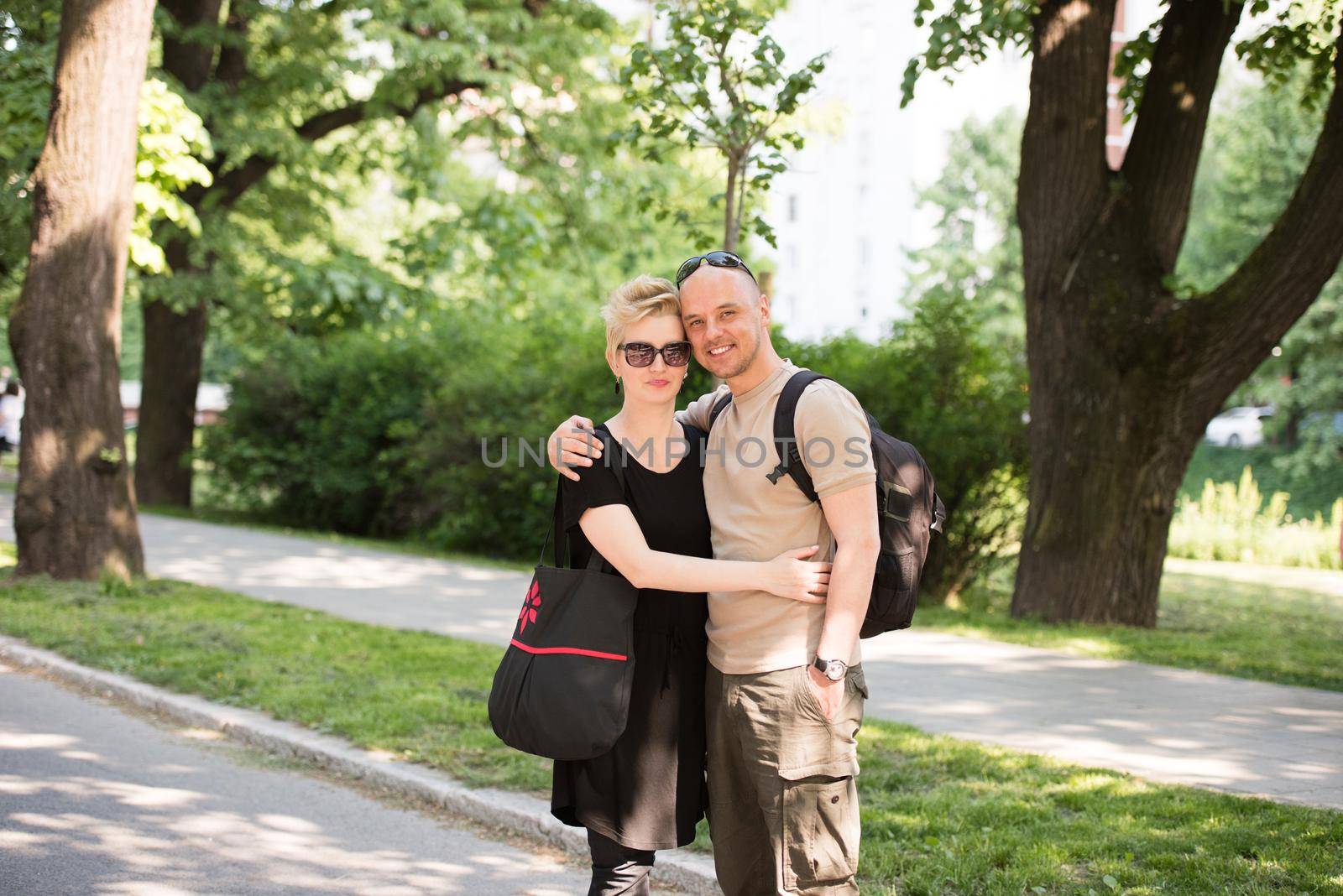 portrait of a couple in the park by dotshock