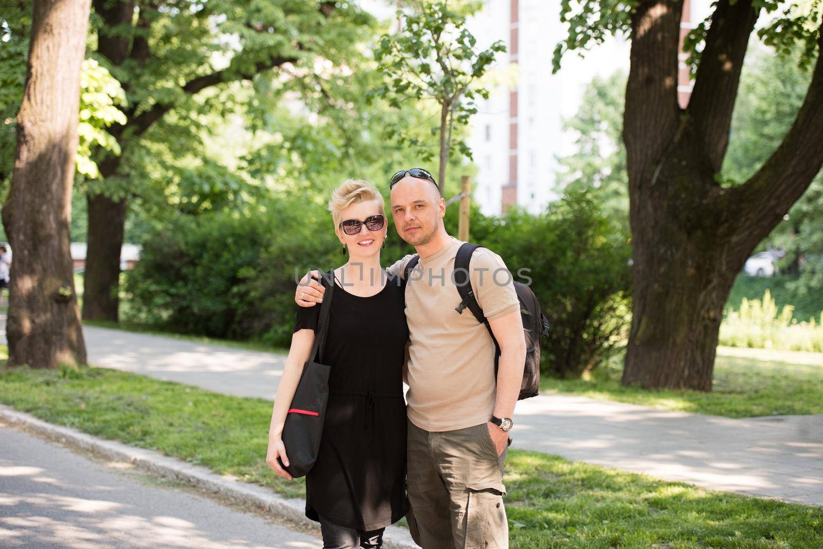 portrait of a couple in the park by dotshock