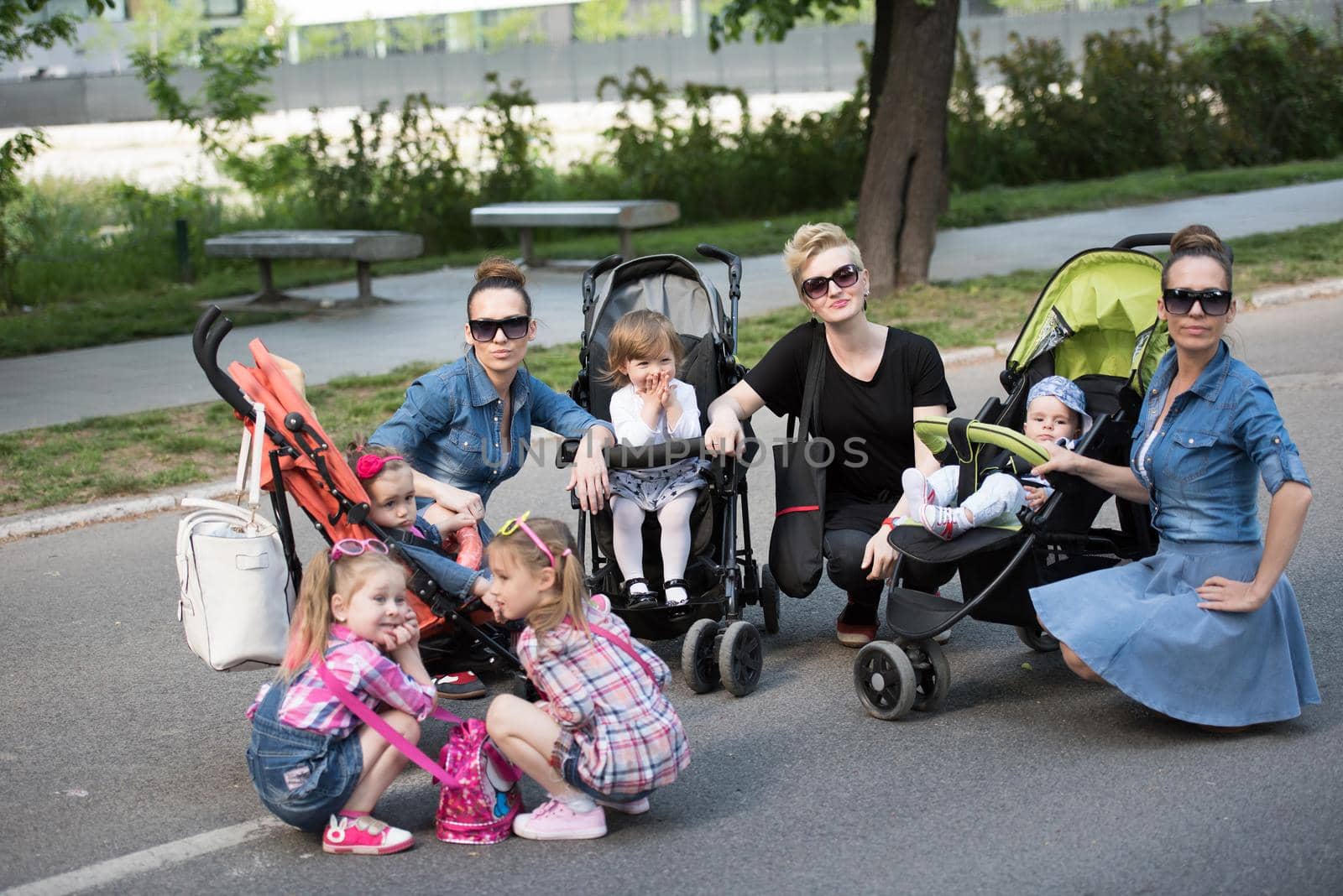 mother with children in the park by dotshock