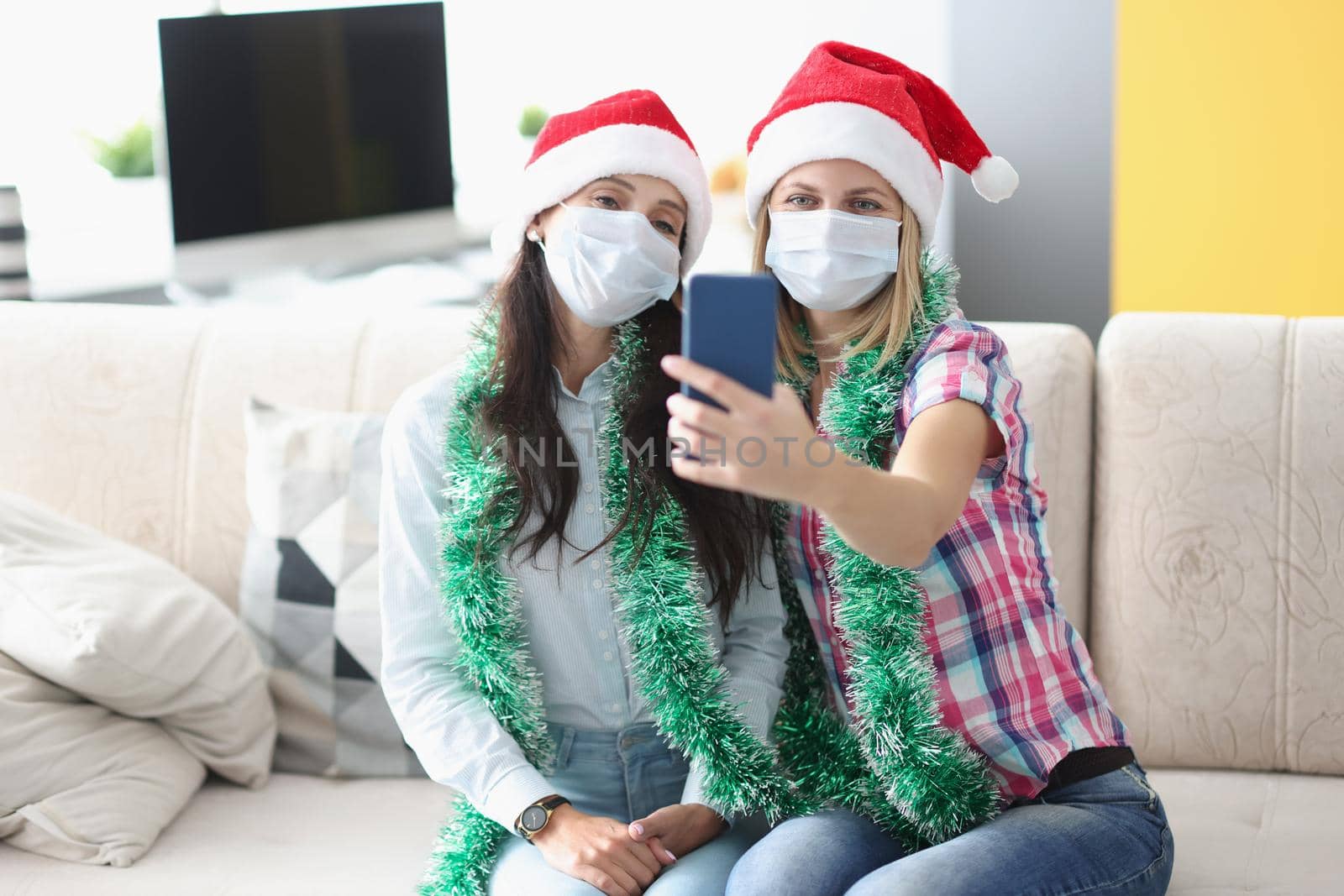 Best friends taking video congratulation with new year, holiday during pandemic by kuprevich