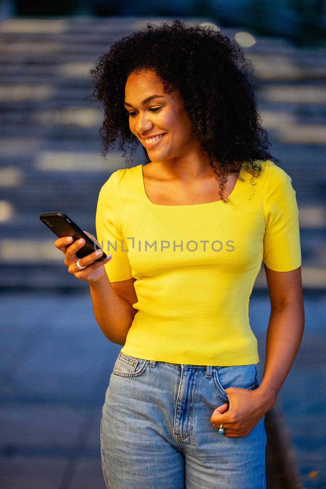 beautiful girl in a yellow t-shirt city lihgts by yulikov