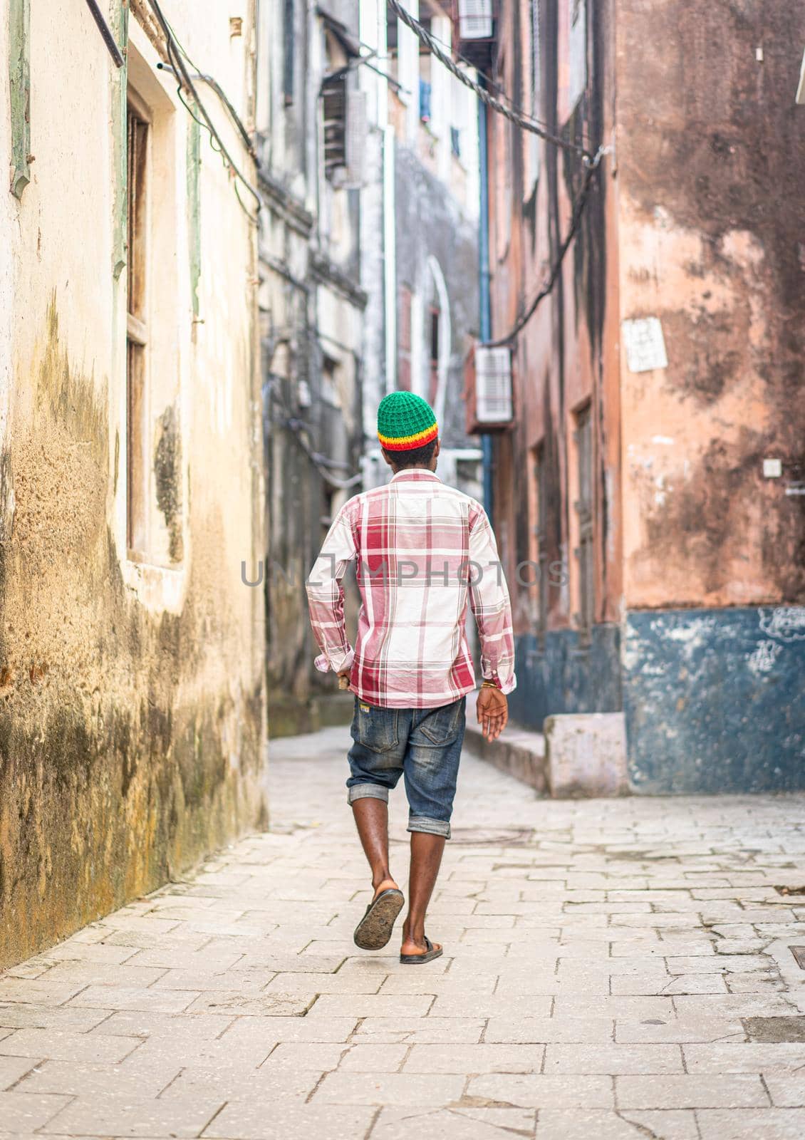 Young black man on city street, High quality photo by Zurijeta