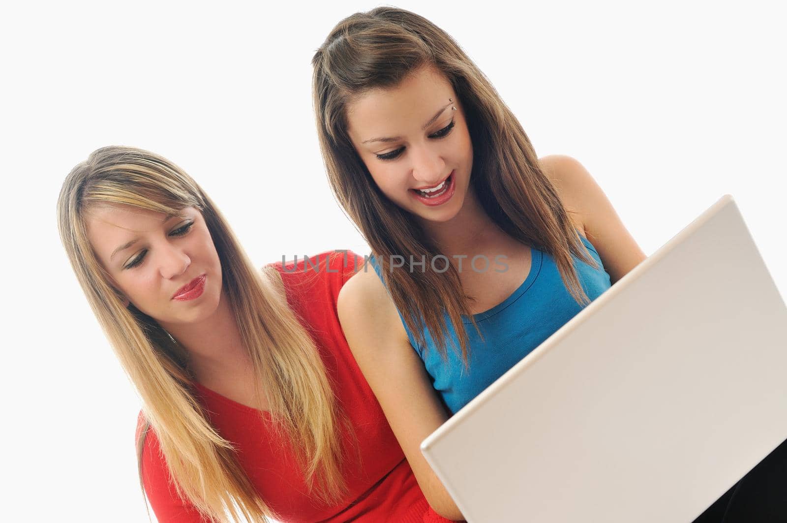 two young woman student work on laptop isolated