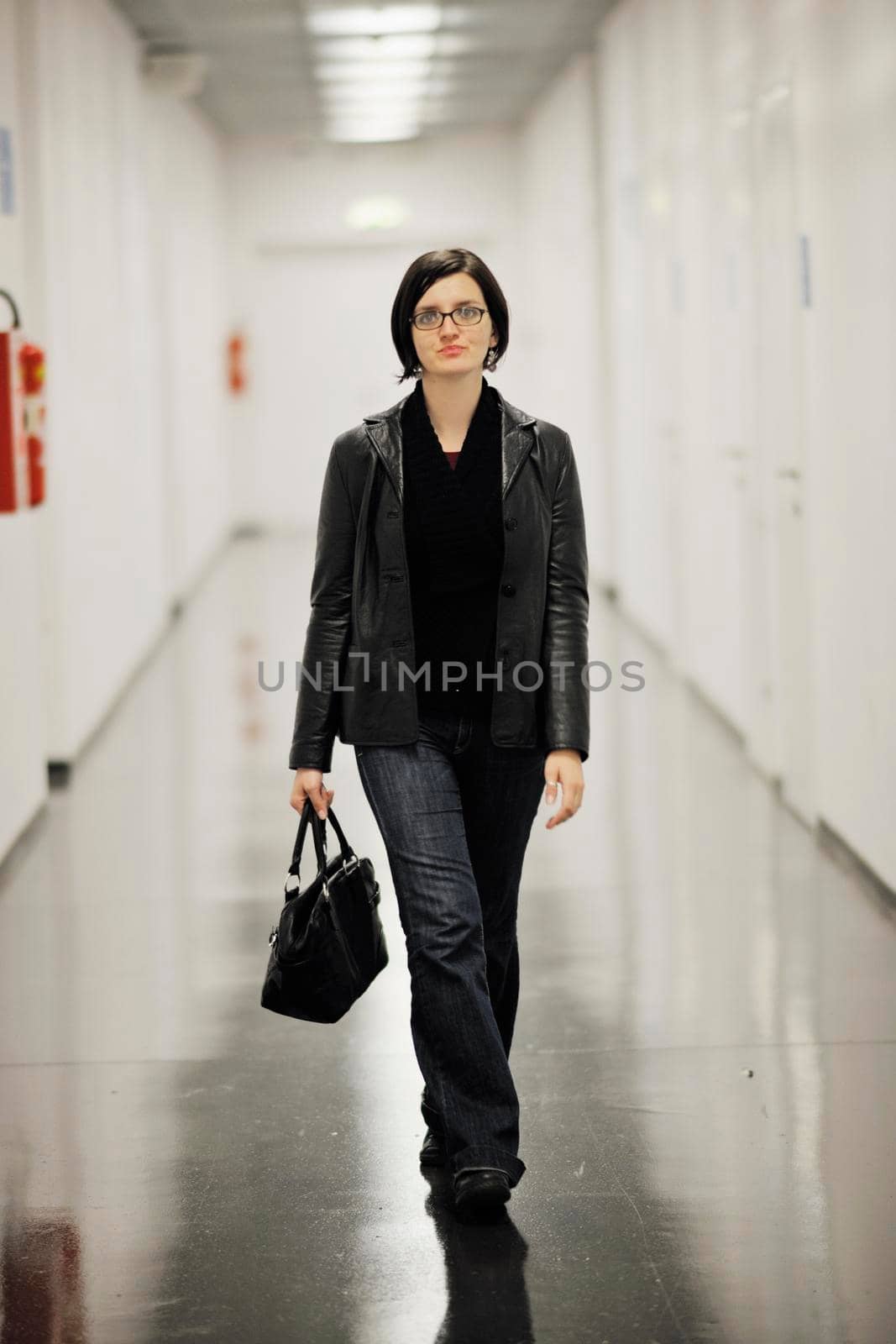 young casual woman relax indoor in big bright hold