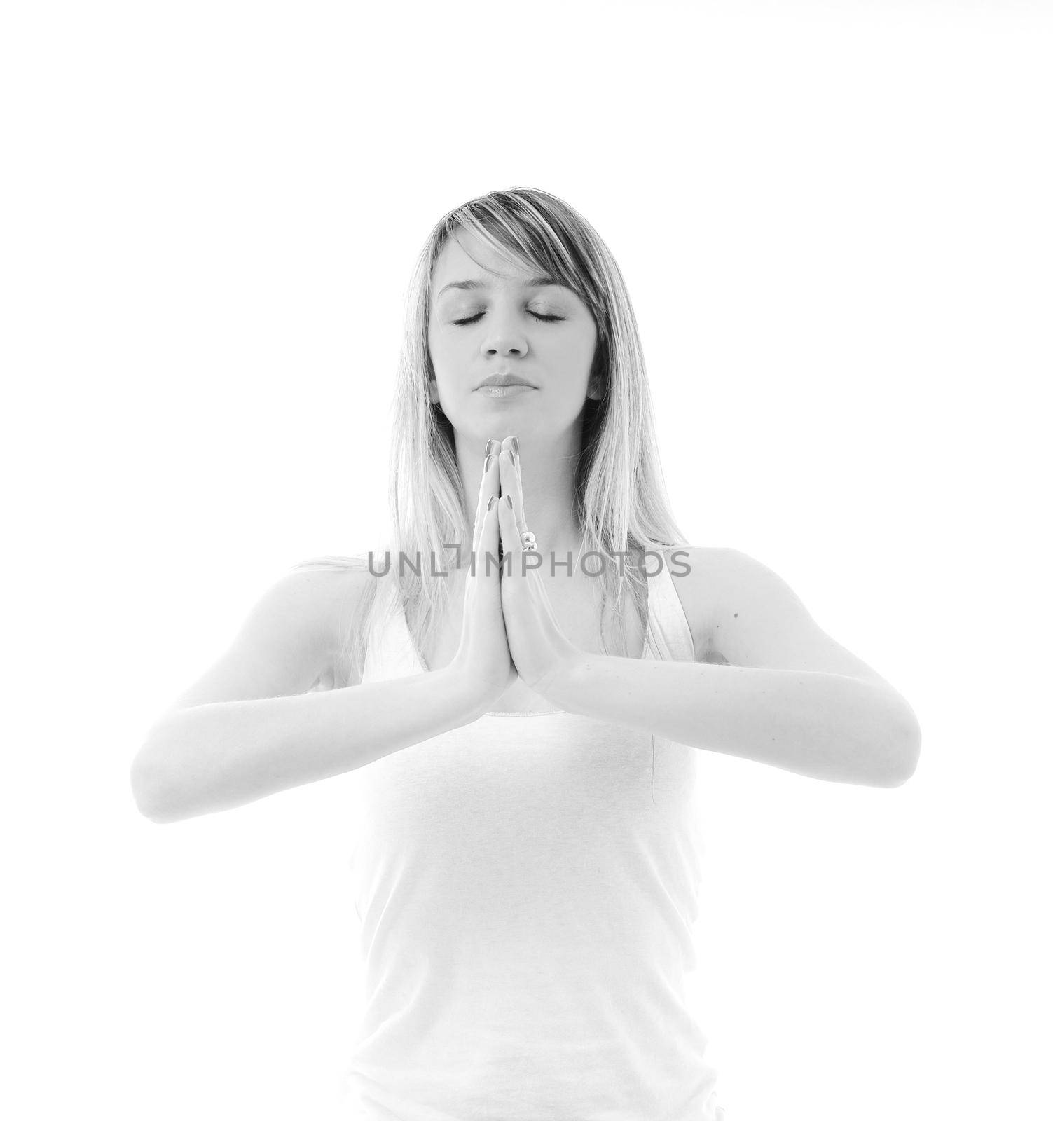 one young fit  woman in white shirt meditating adn exercise  yoga isolated