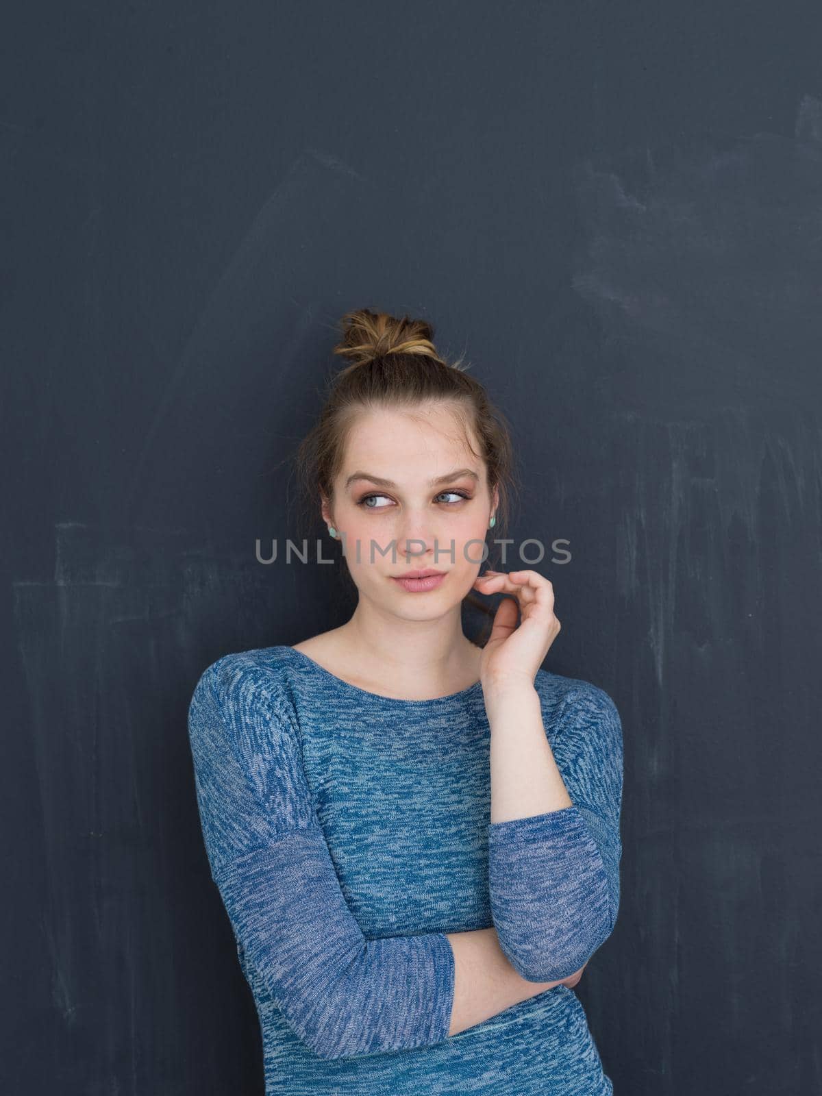 portrait of Beautiful young woman isolated on grey background