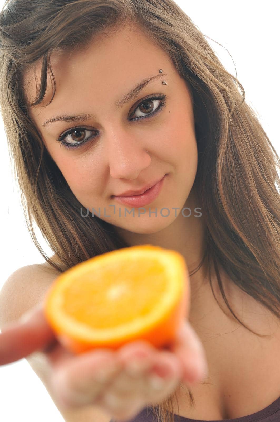 young woman orange isolated fruit food