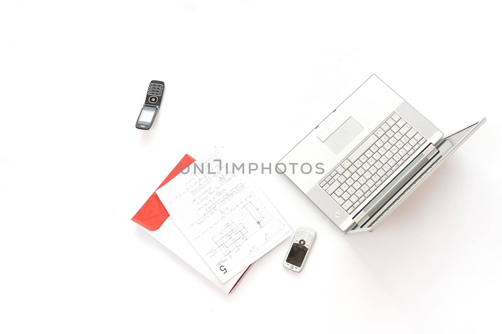 solver laptop cell phone and documents isolated on white