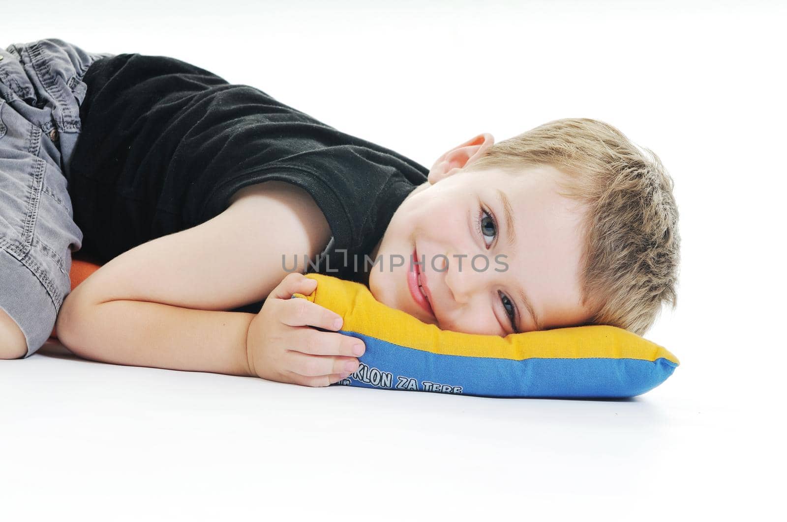 happy kid play on floor isolated on white