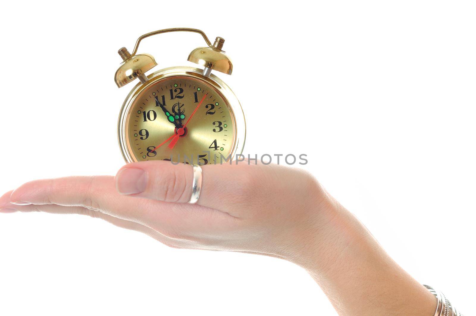 young happy woman hold clock isolated on white