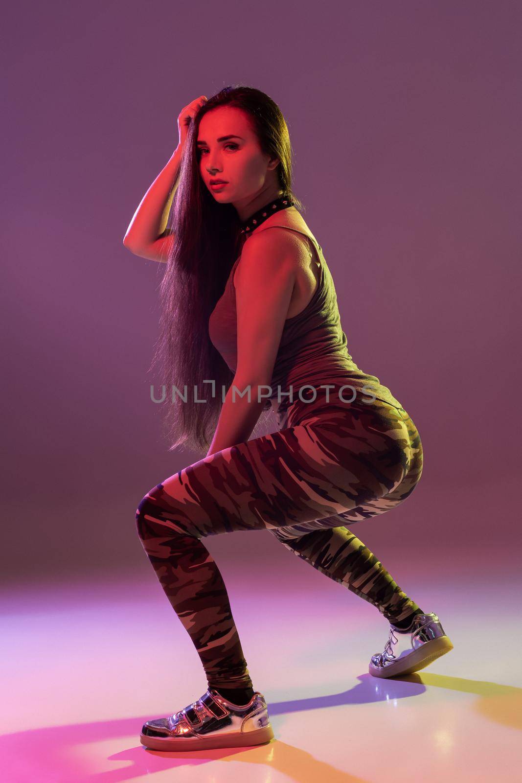 Attractive girl dancing twerk in the studio. Dancing. Hobby