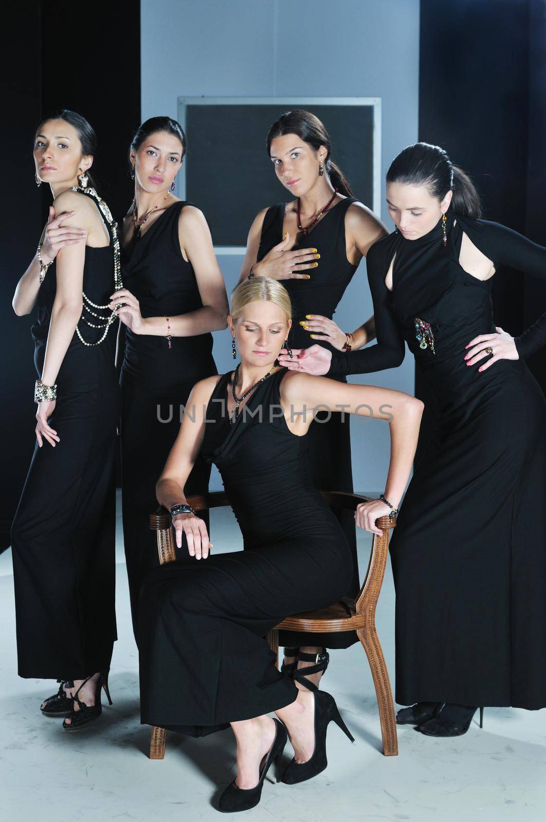 beautiful woman on fashion show piste with gold jawel