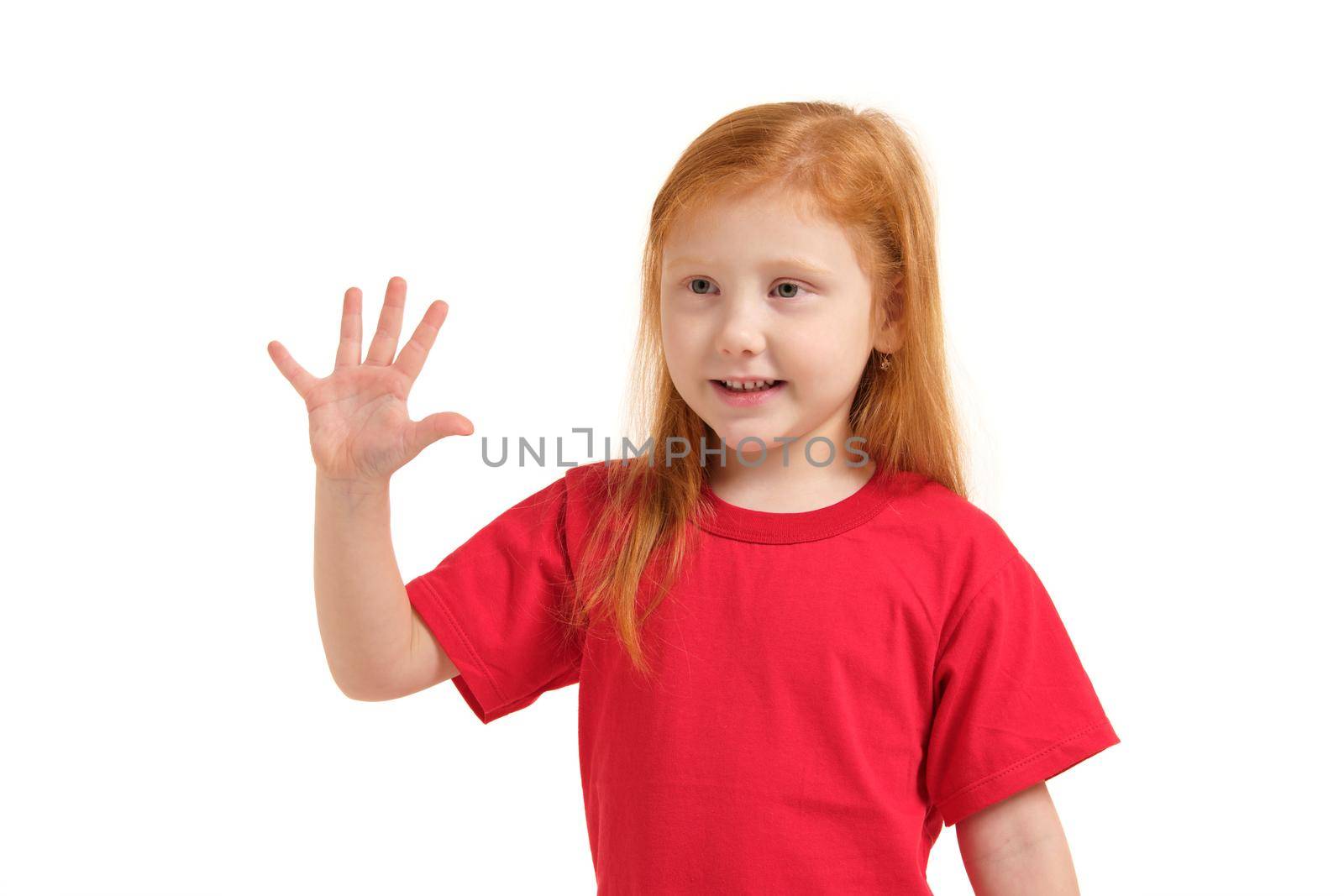 A little girl in a red t-shirt shows gesture - five fingers, isolated on white background. Children's emotions. Child looking away