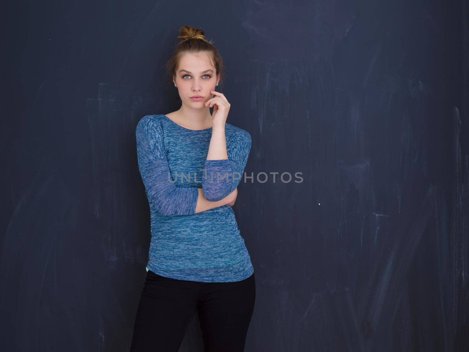 portrait of Beautiful young woman isolated on grey background