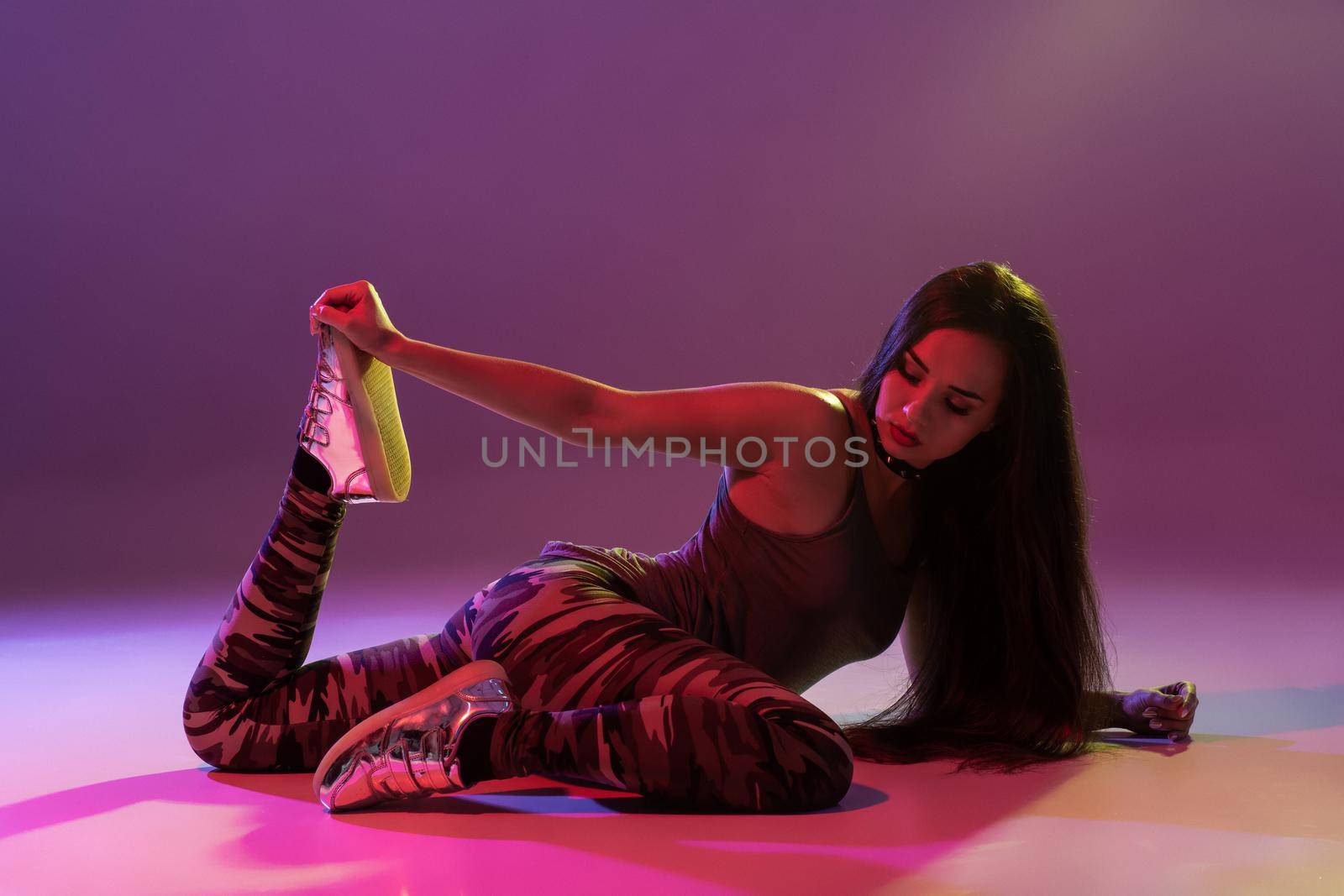 Attractive girl dancing twerk in the studio. Dancing. Hobby