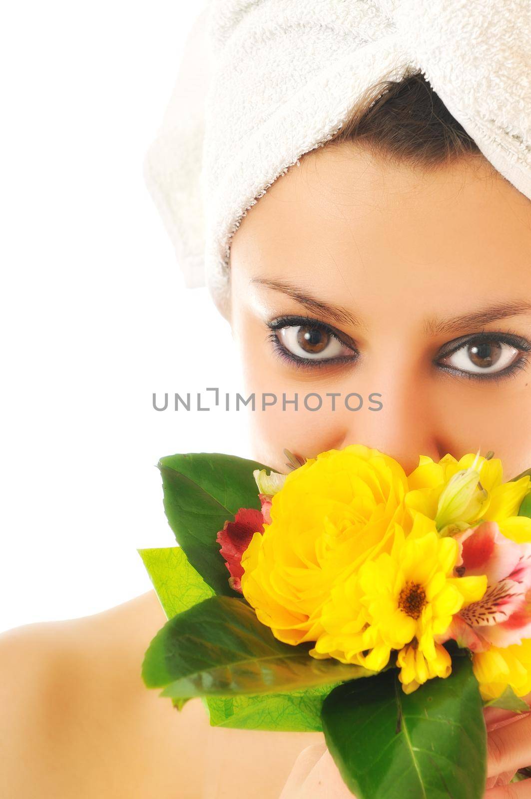 beauty halth and spa wellness isolated young woman face portrait closeup with towel and flower treatment