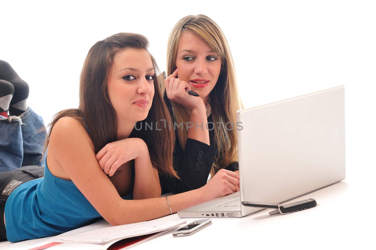 two young woman student work on laptop isolated