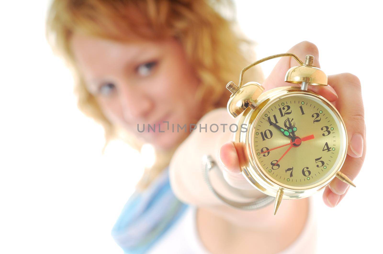 young happy woman hold clock isolated on white
