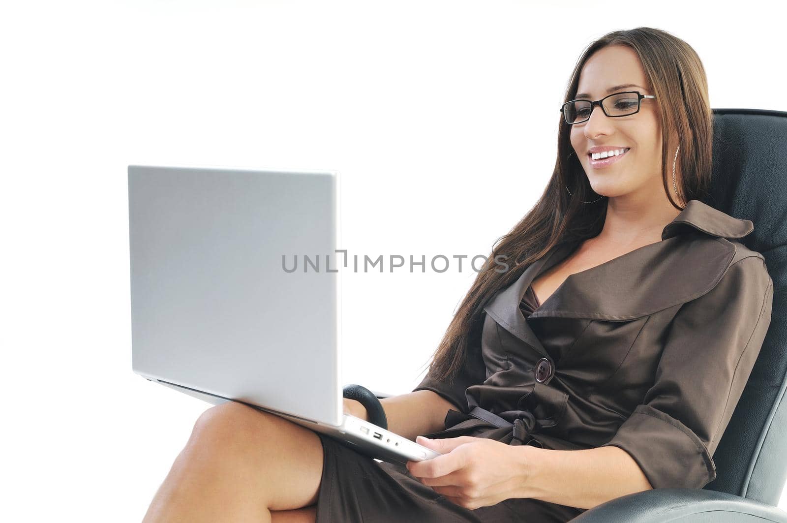 young beautiful business woman isolated on white workling on laptop computer