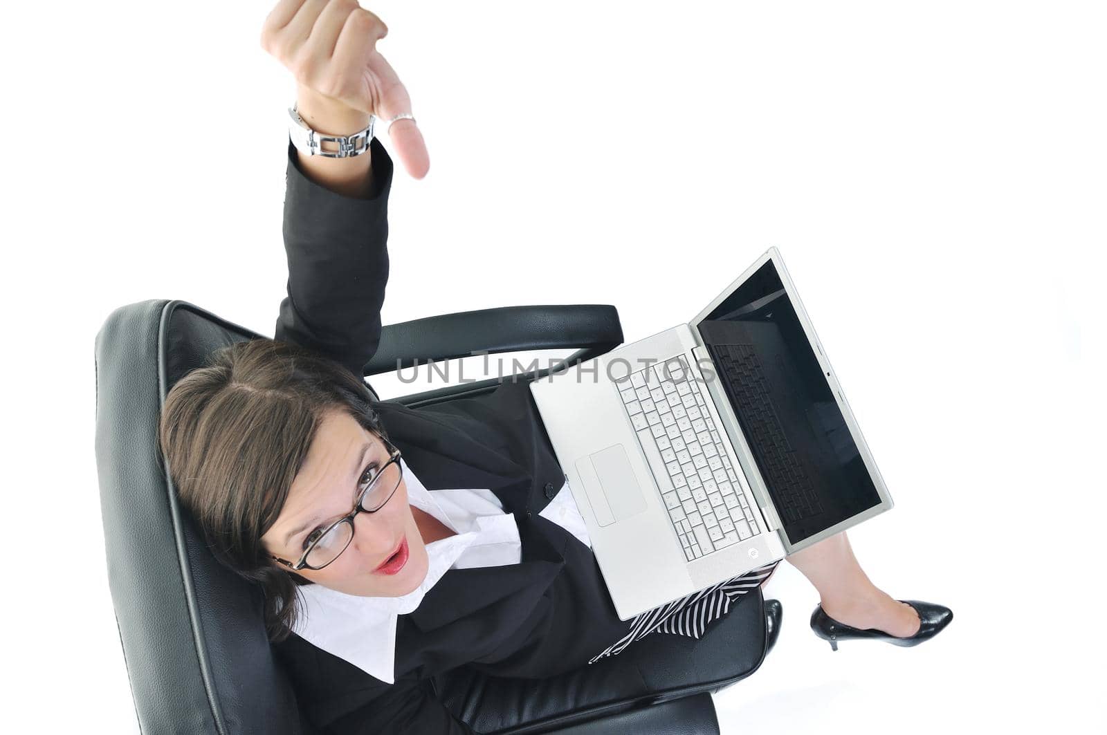 young beautiful business woman isolated on white workling on laptop computer