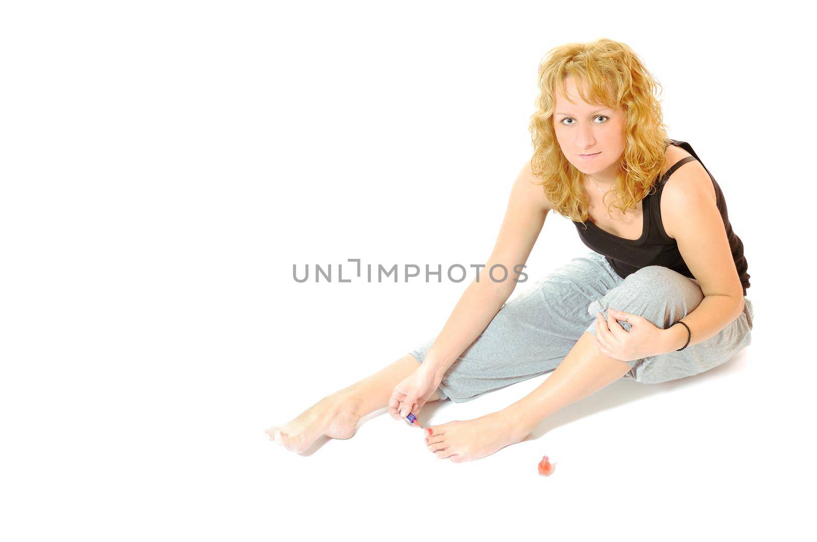 woman leg care concept with woman foots and hands isolated on white