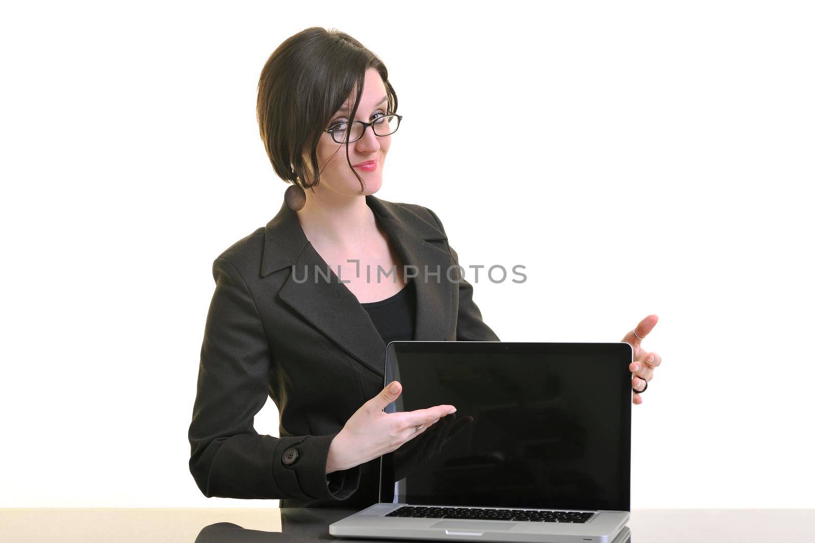 one young business woman isolated on white working on laptop computer