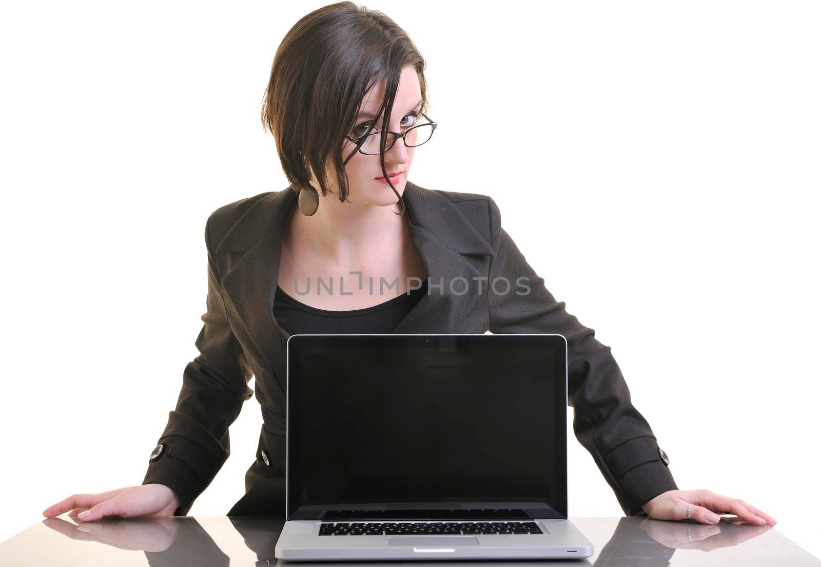 one young business woman isolated on white working on laptop computer