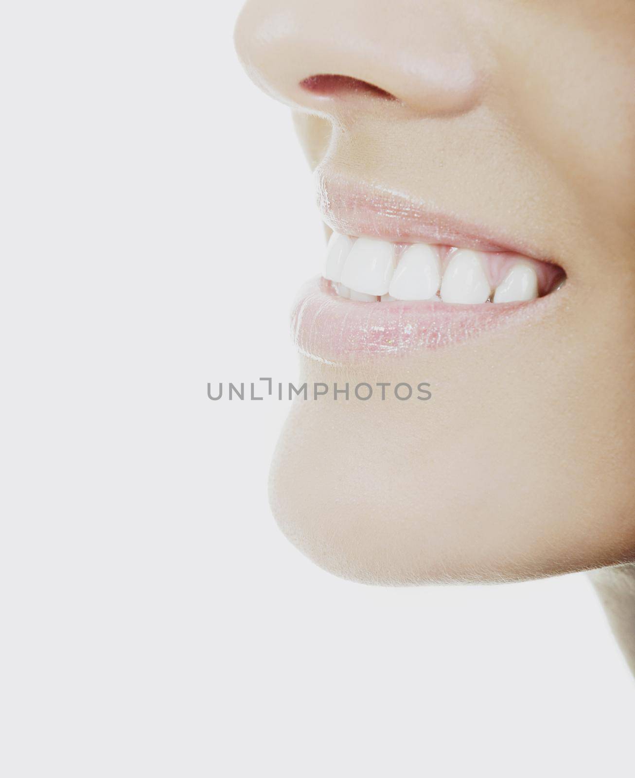 young woman with white teeth smiling representing healthy lifestyle and teeth concept