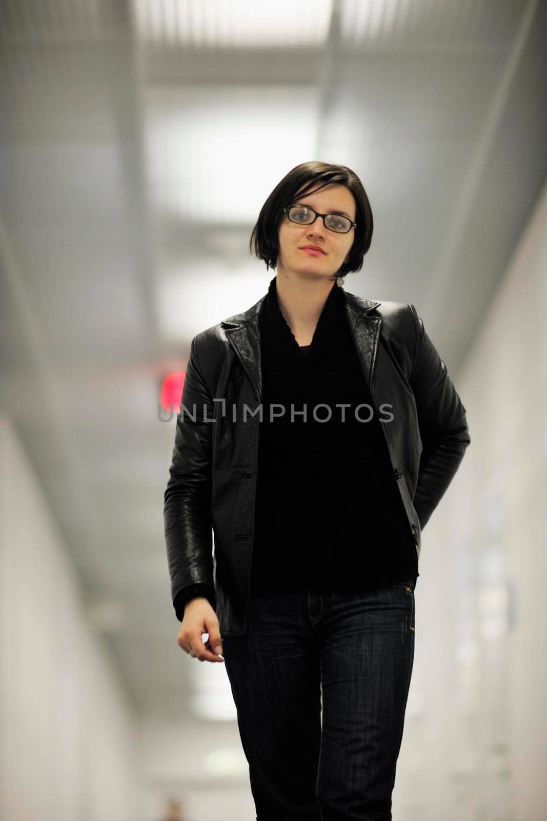 young casual woman relax indoor in big bright hold