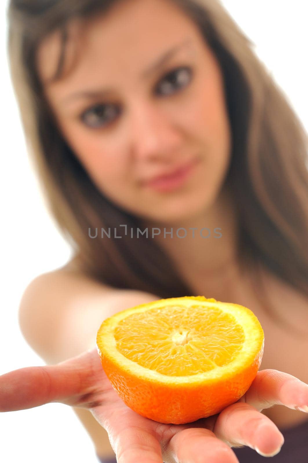 young woman orange isolated fruit food