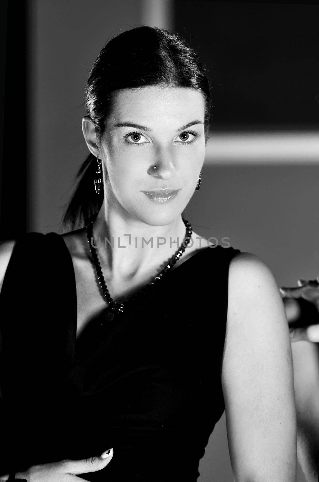 beautiful woman on fashion show piste with gold jawel