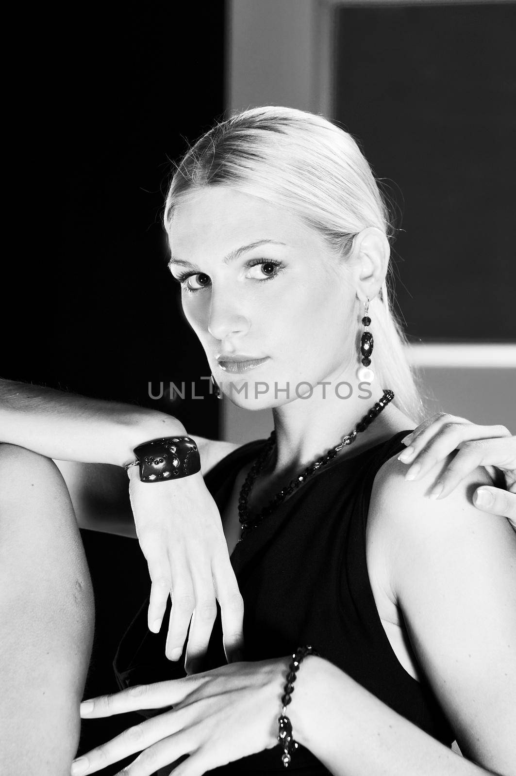 beautiful woman on fashion show piste with gold jawel