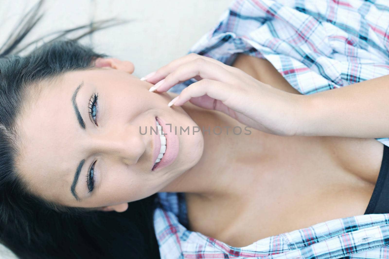 beautiful young woman lady posing in green moden outdoor garden