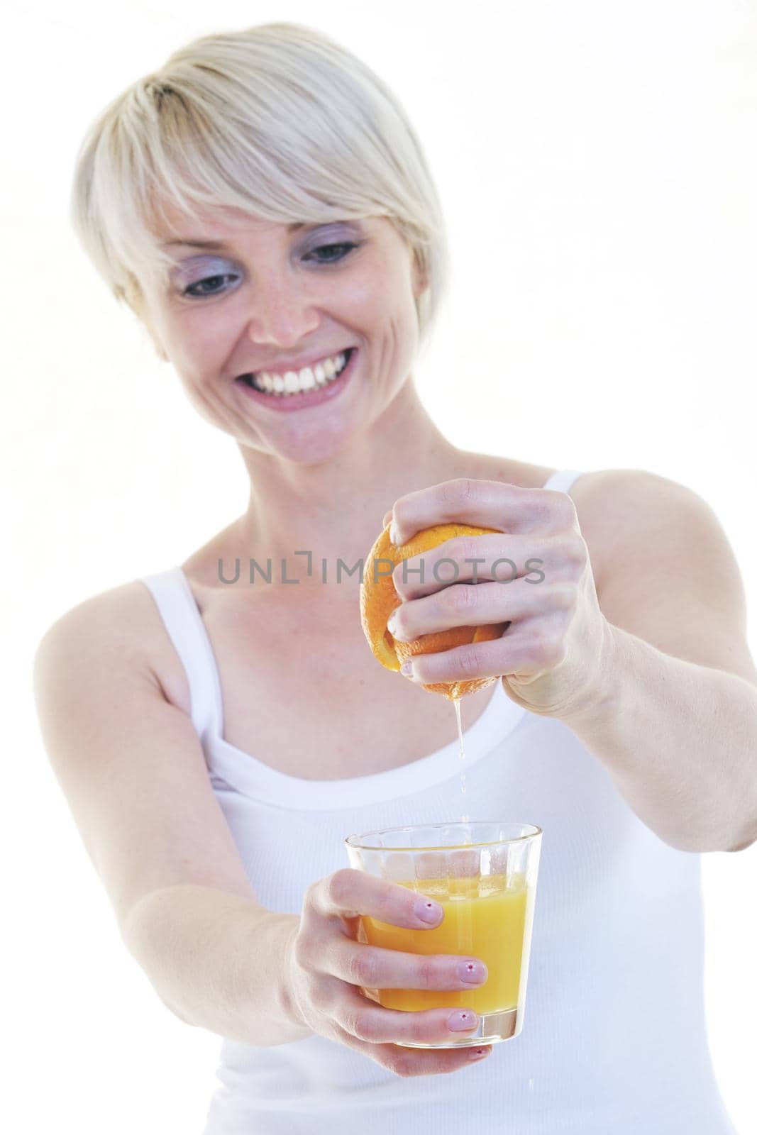 woman squeeze fresh orange juice drink  isolated over white background