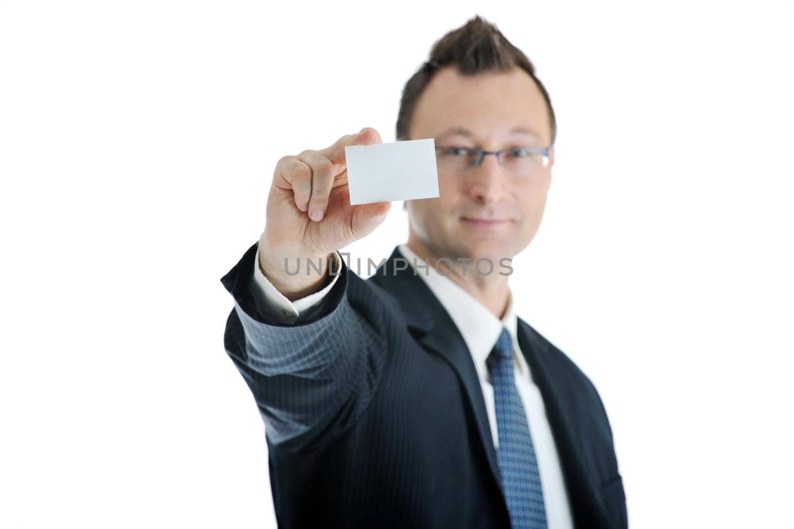 portrait of young businessman with empty business card isolated on white background 