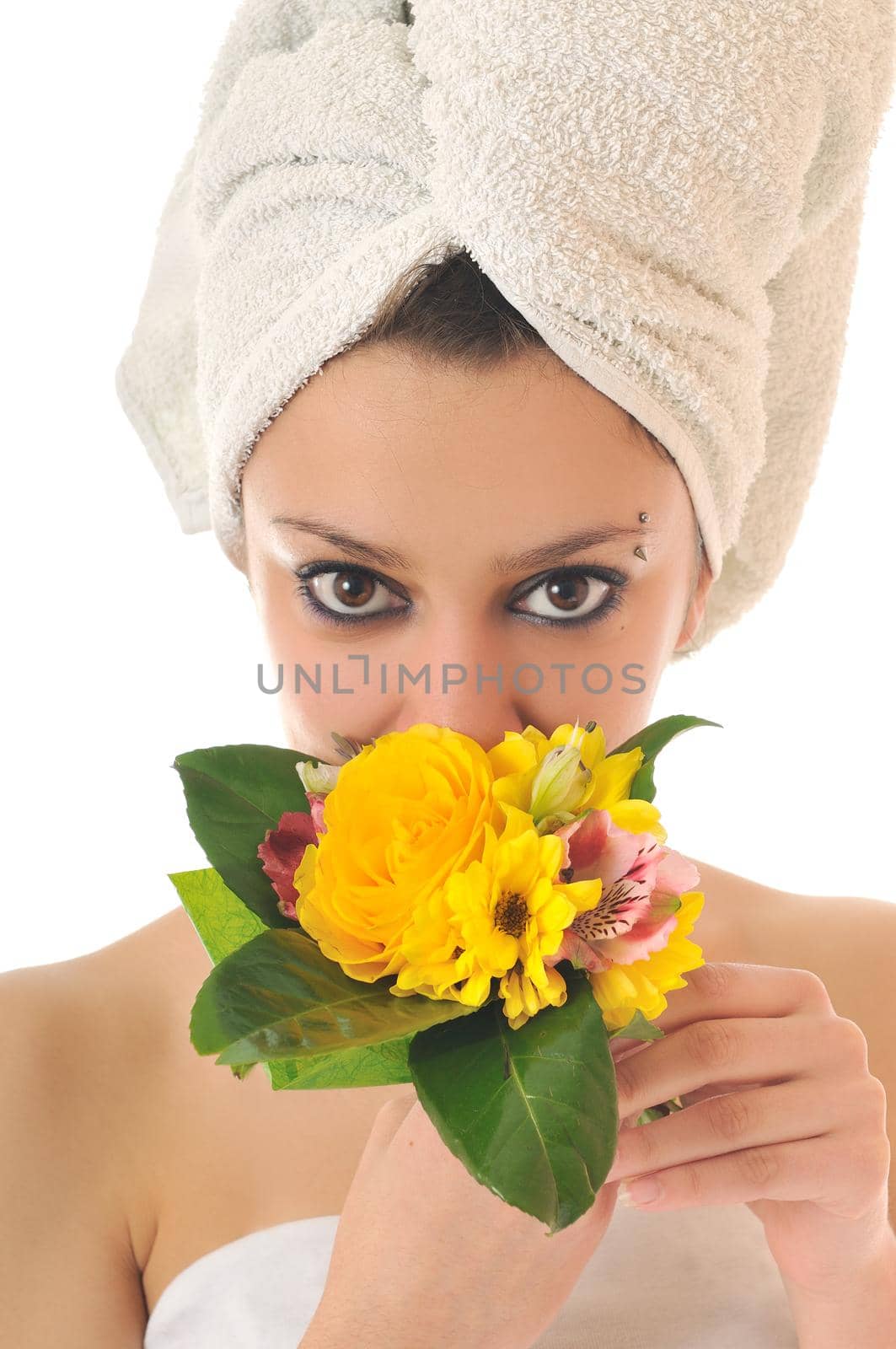 beauty halth and spa wellness isolated young woman face portrait closeup with towel and flower treatment