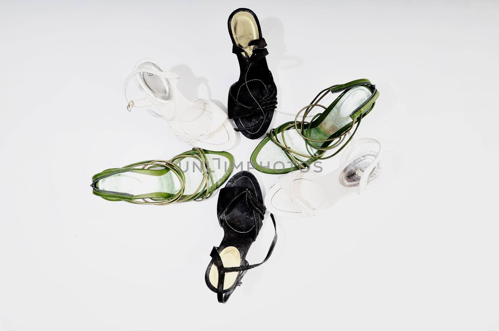 many woman shoes isolated on white  representing fashion diversity concept