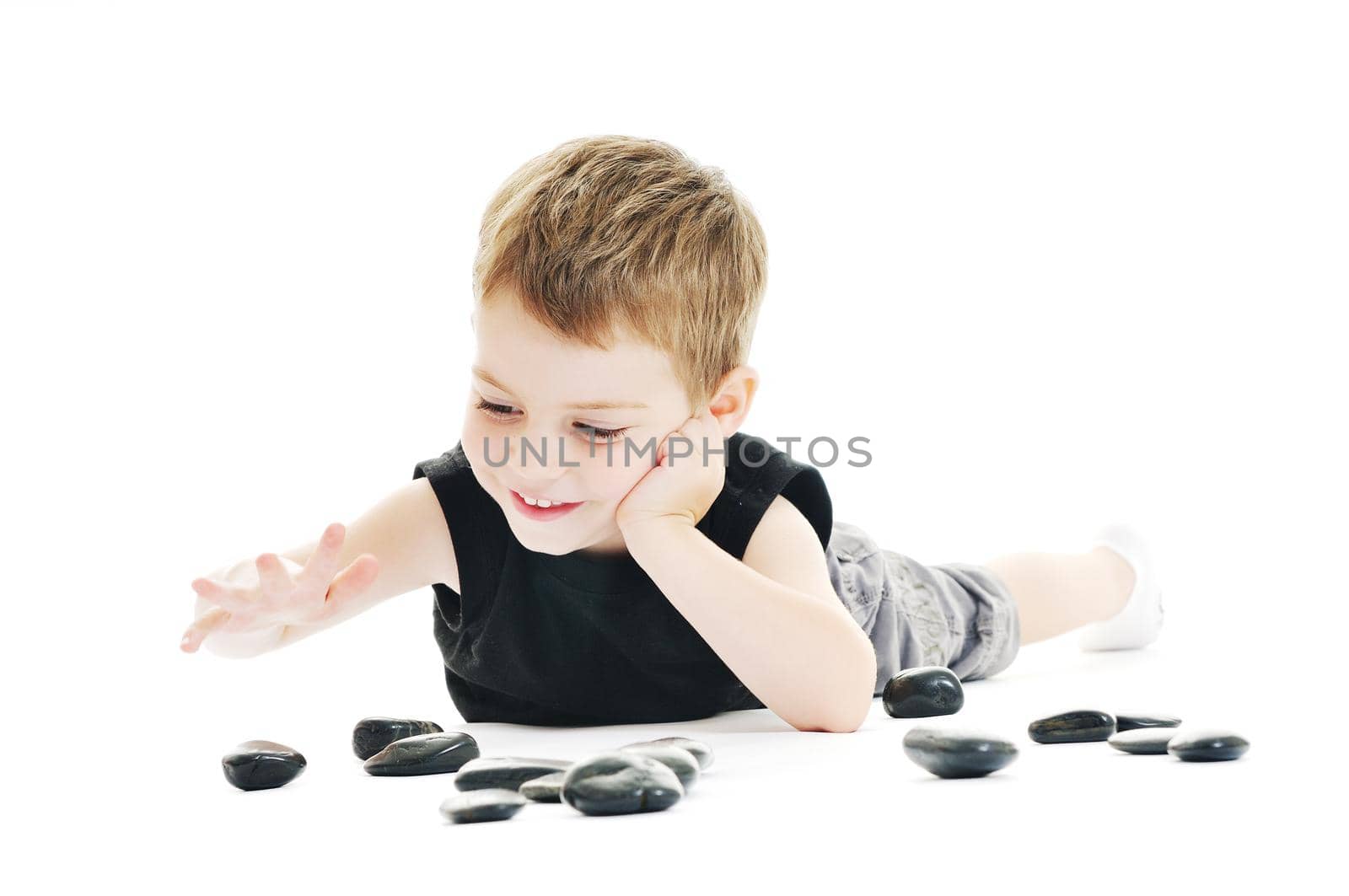 happy kid play on floor isolated on white