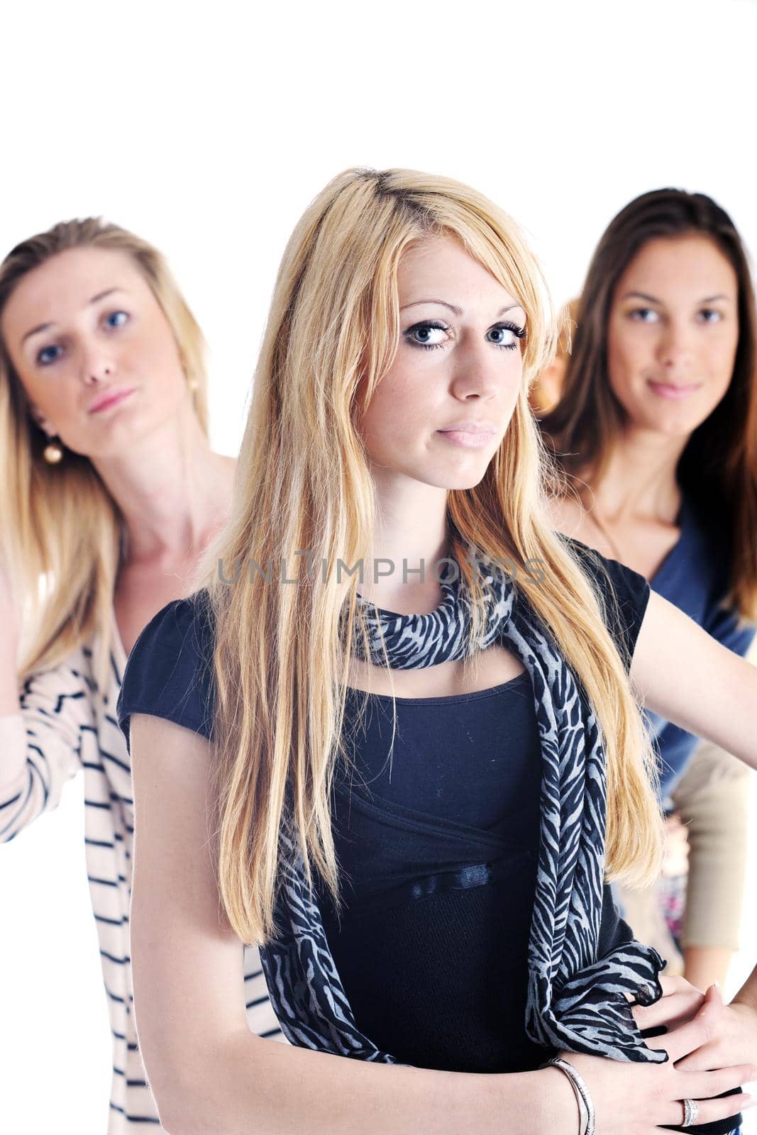 happy girls group have fun and joy while smilling and leafing in studio  isolated on white background