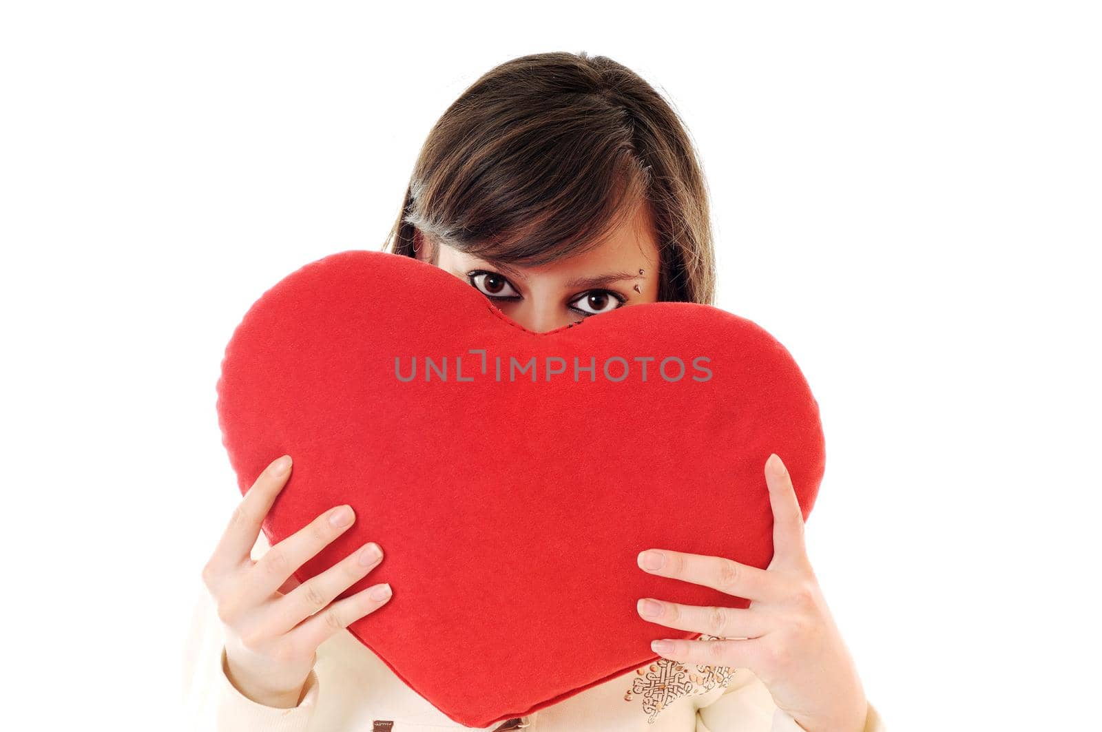happy young woman with heart isolated on white