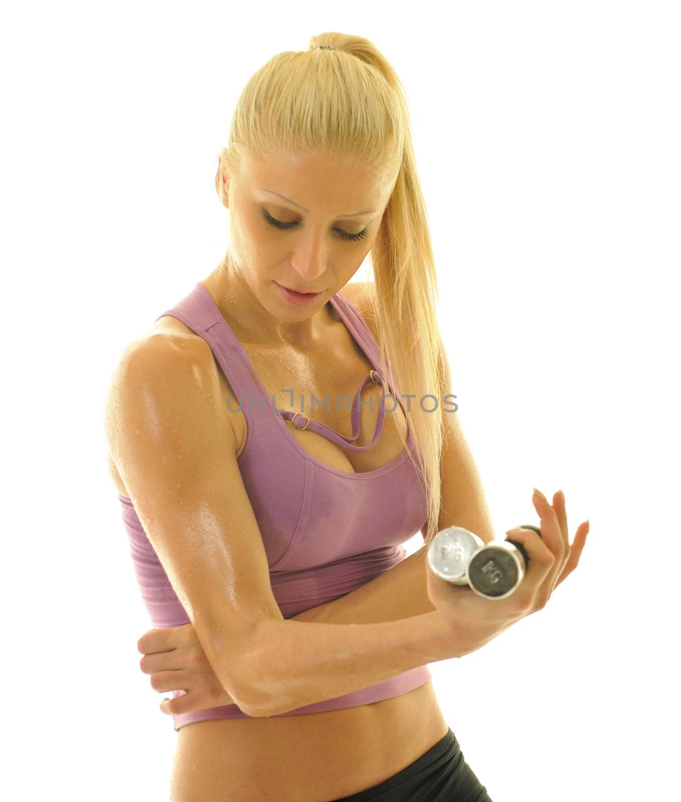 young beautiful woman exercise fitness pose isolated on white in studio