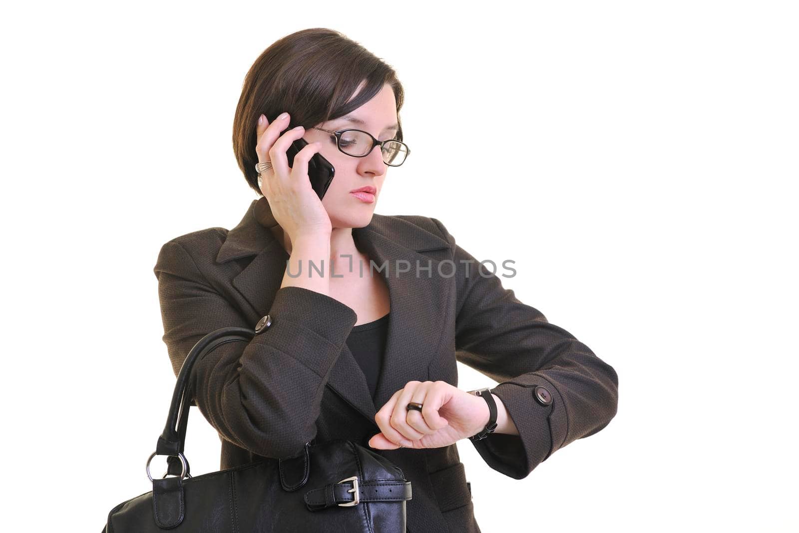 young business woman isolated on white talking on cellphone late on meeting and tlkinging on cellphone