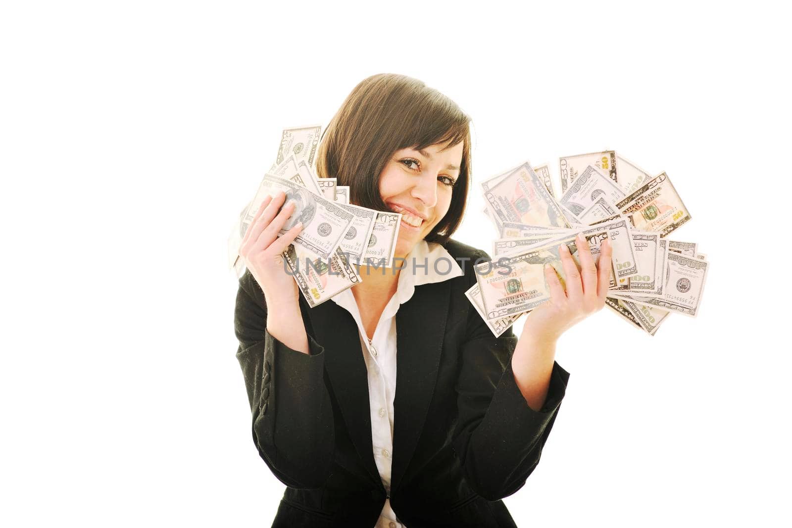 happy young business woman isolated on white playing with dollars money and representing success in finance