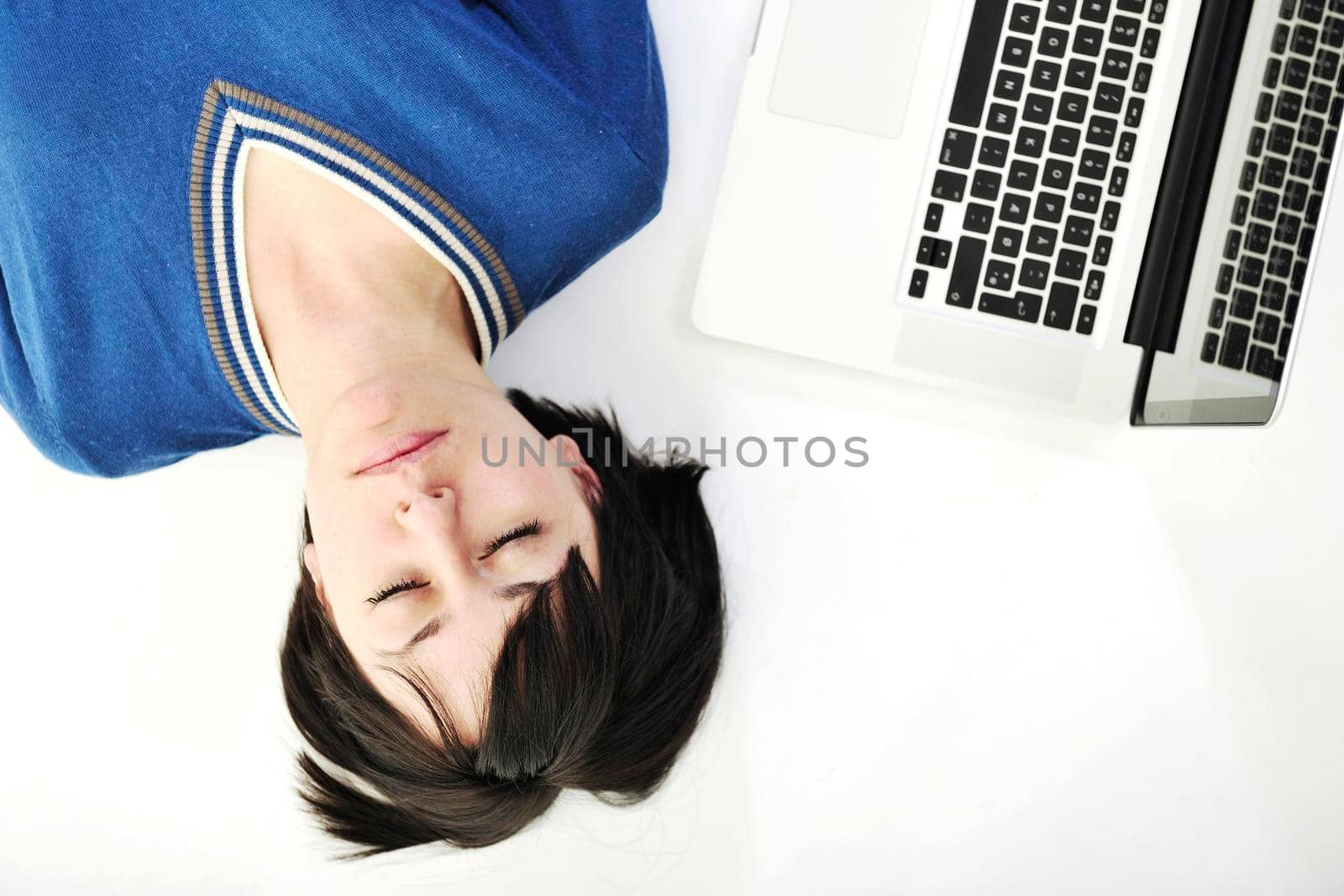 young beautiful brunette student woman working on laptop computer and finding solutions