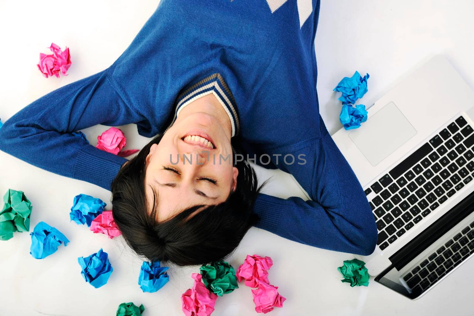 young beautiful brunette student woman working on laptop computer and finding solutions